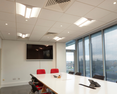Recessed performance LED modular lighting in office space.